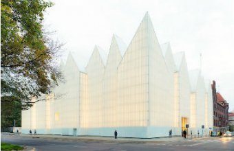 O sala de concerte al carei volum aminteste de un mare bloc de cuart alb